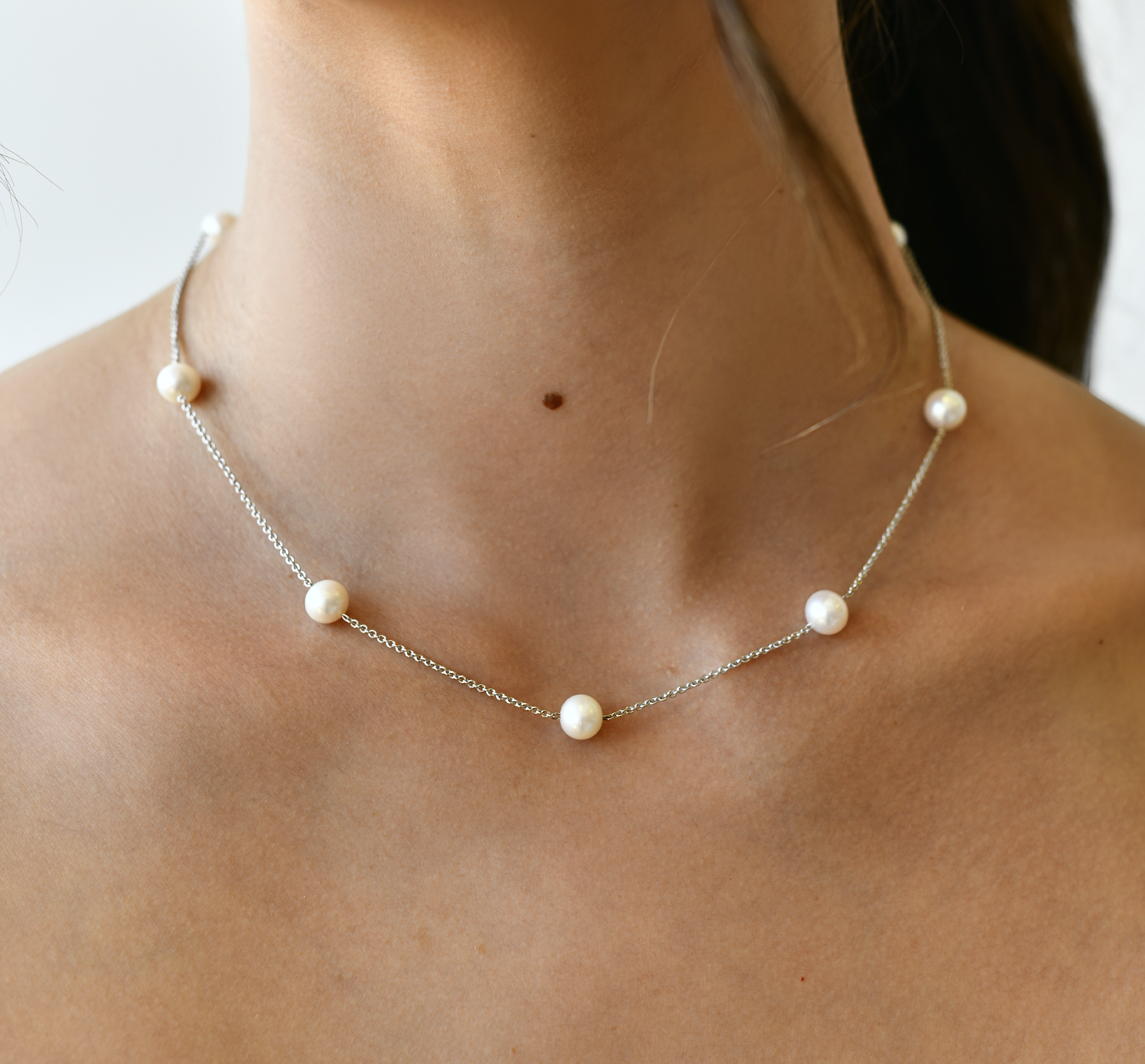 14K White Gold Fresh Water Pearl Necklace with model's neck