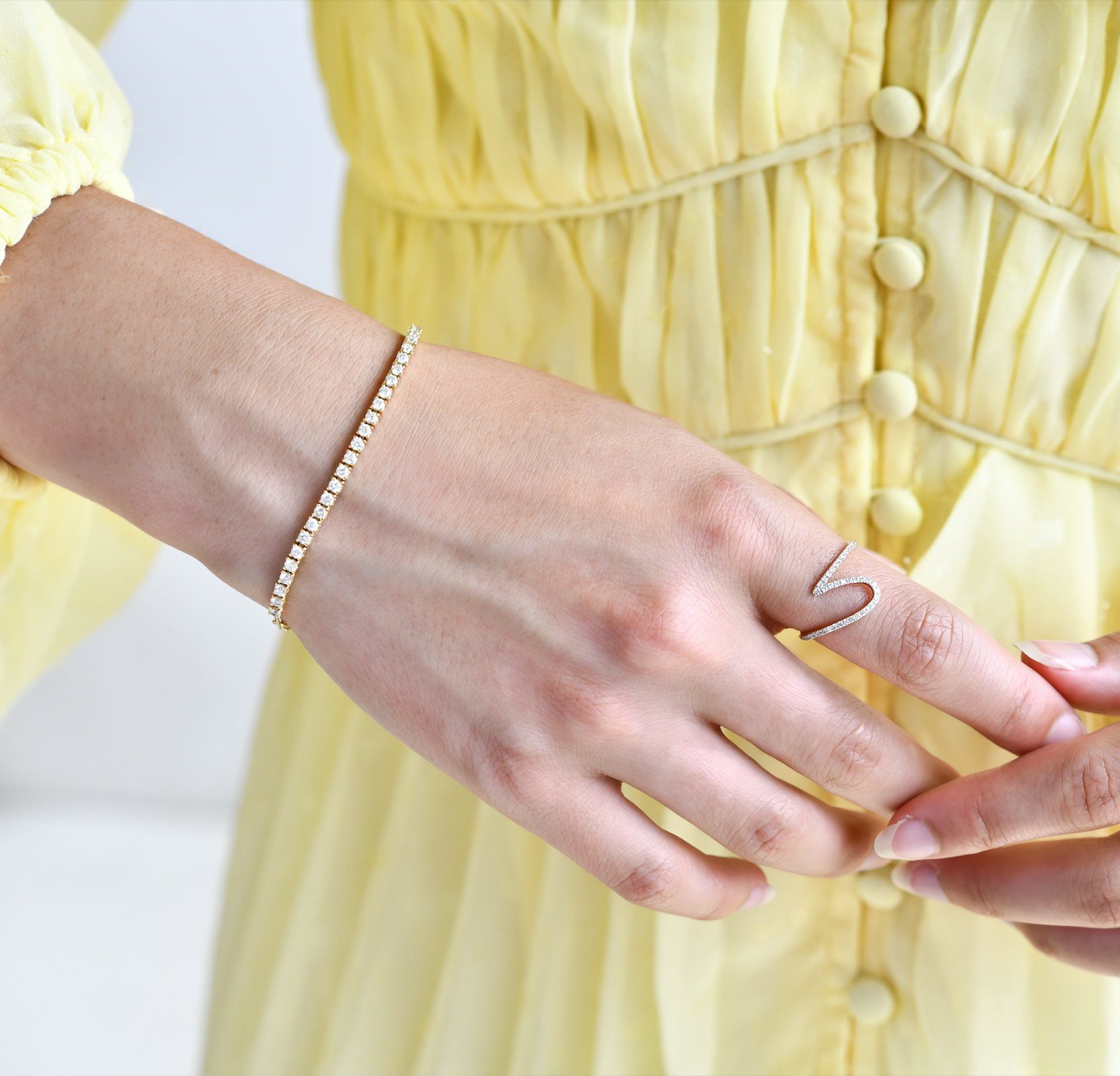 18K Gold Wavy Diamond Ring with model's hand