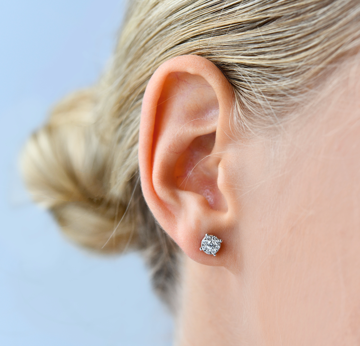 18K White Gold Cluster Diamond Stud Earrings with model's ear