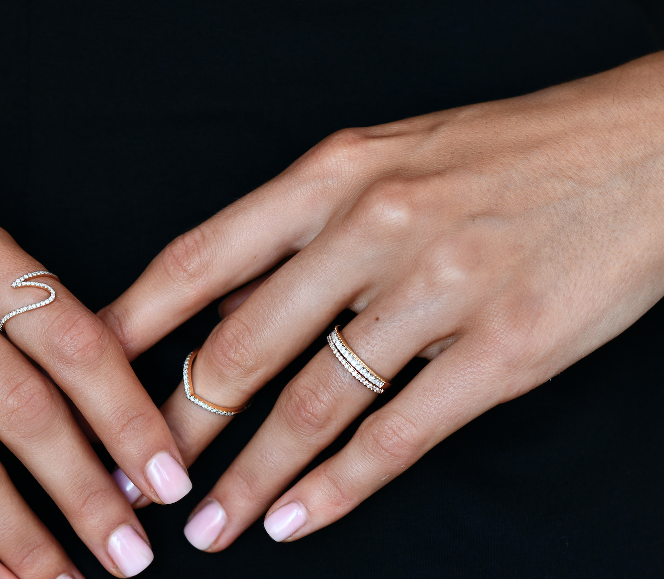 18K Gold Diamond Eternity Band with model's hand
