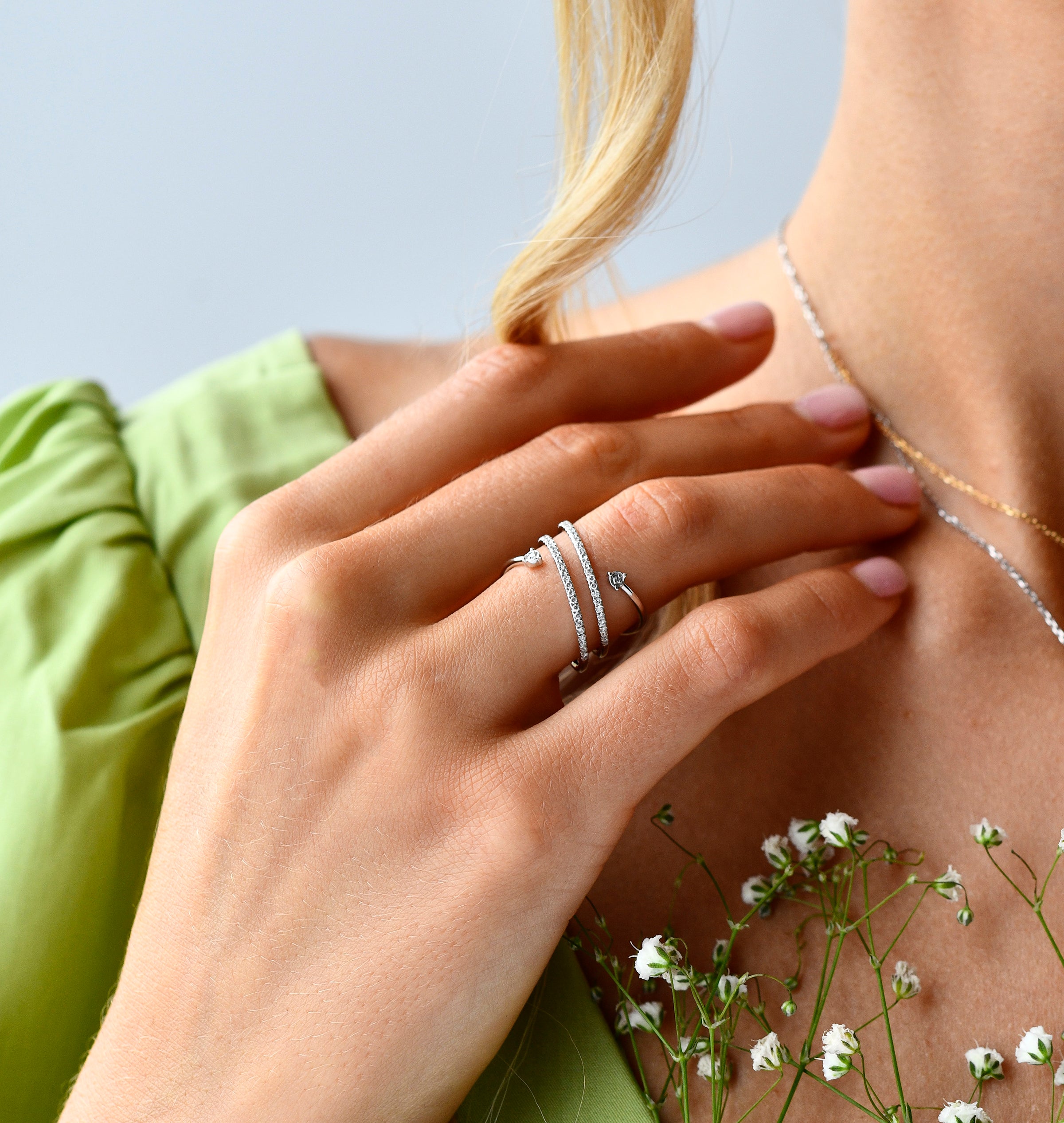 18K White Gold Double Spiral Diamond Ring with model's hand