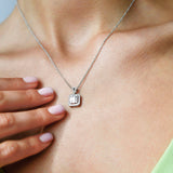 18K White Gold Multi Diamond Pendant with Halo with model's neck