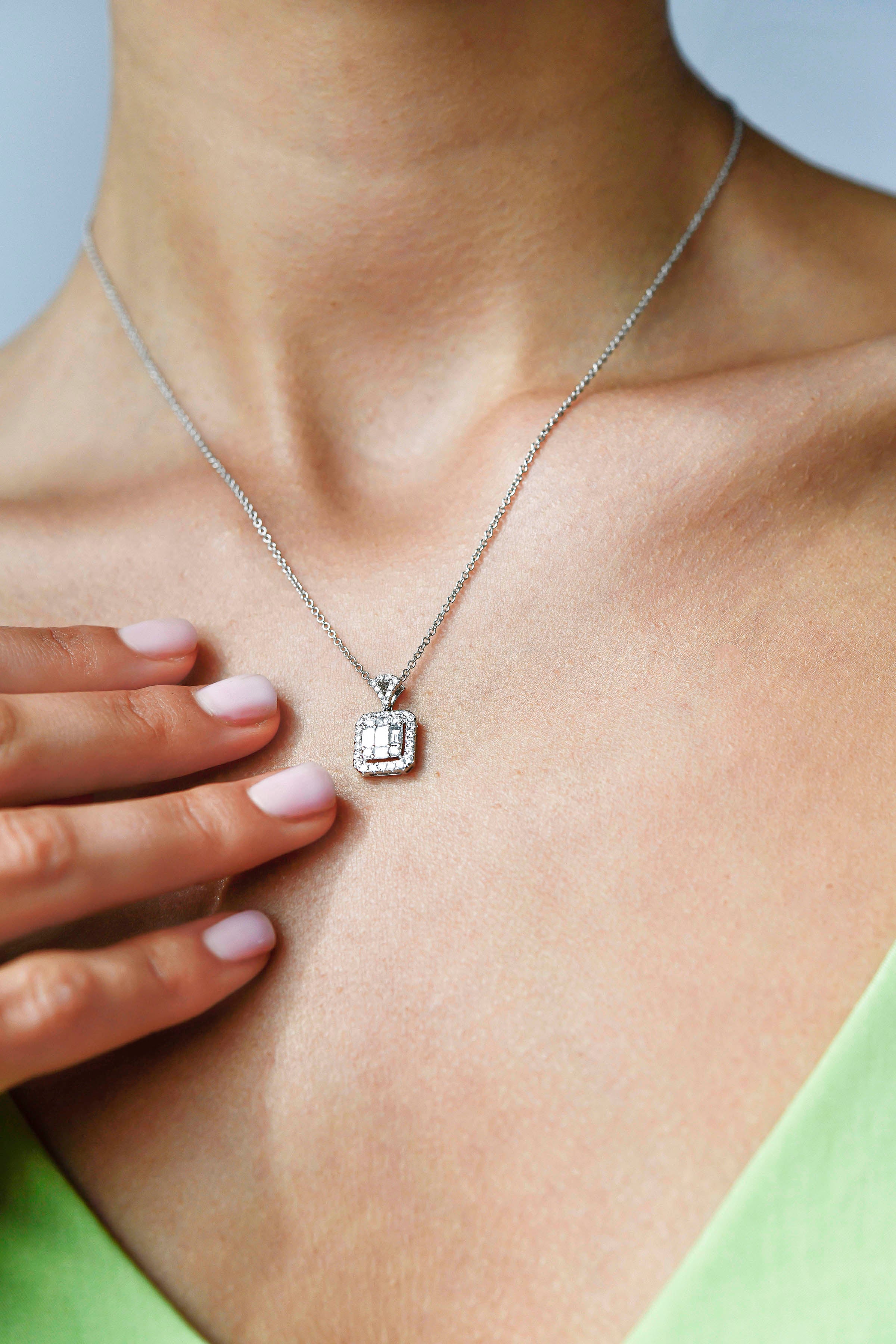 18K White Gold Multi Diamond Pendant with Halo with model's neck